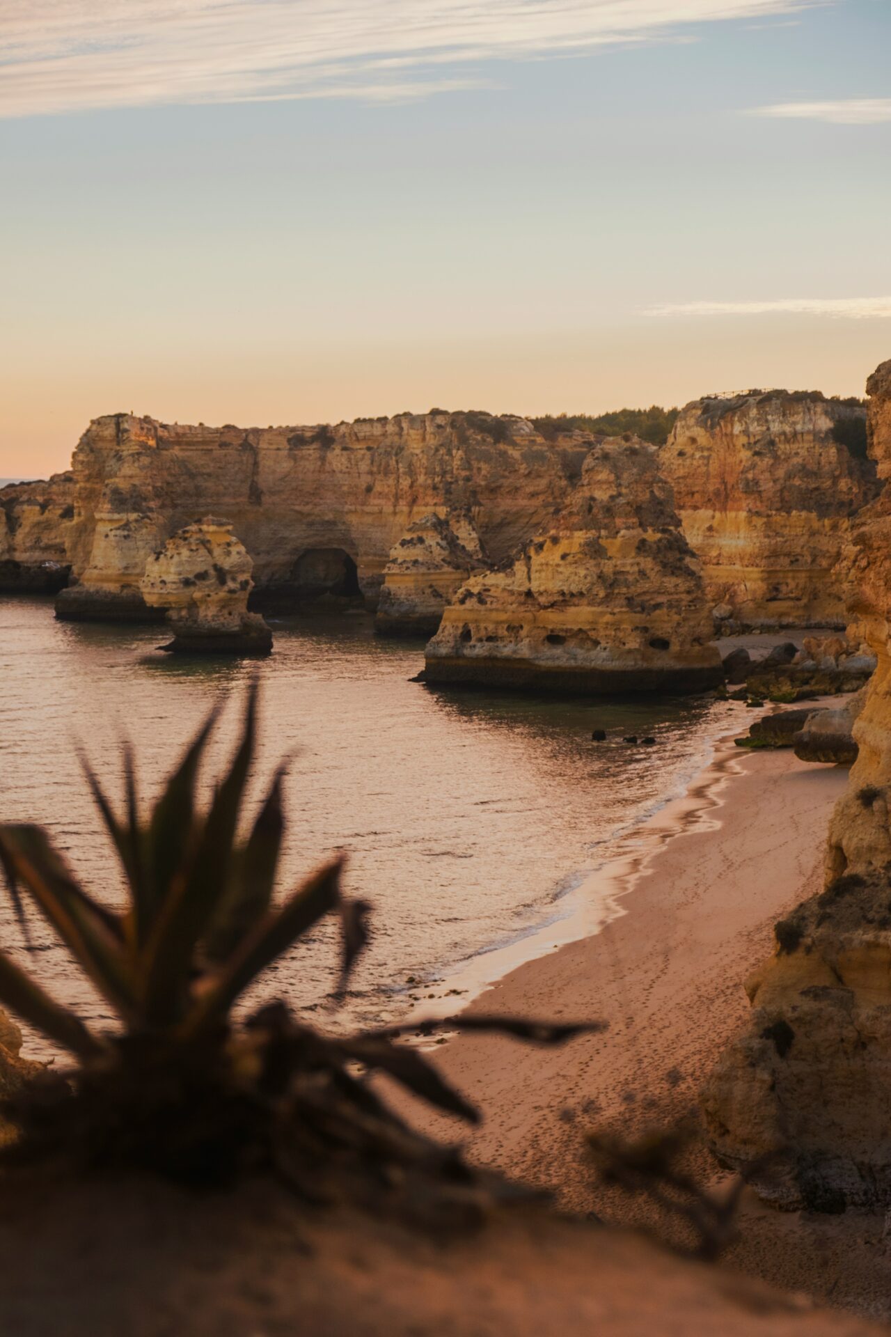 Sunset over Algarve cliffs and beaches with ocean views